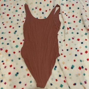 Burgundy brown body suite not warm much at all